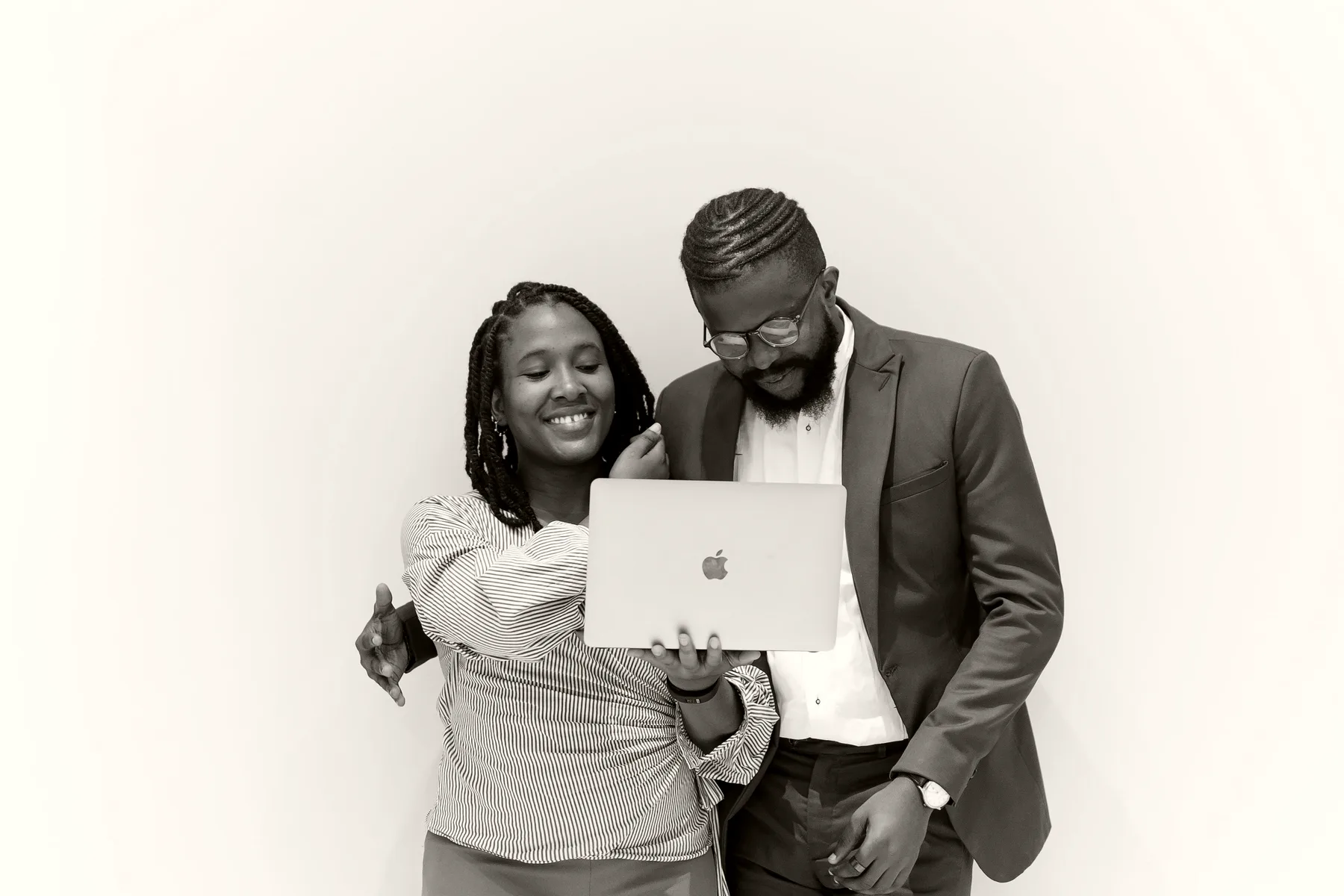 African professionals collaborating with technology in a modern office